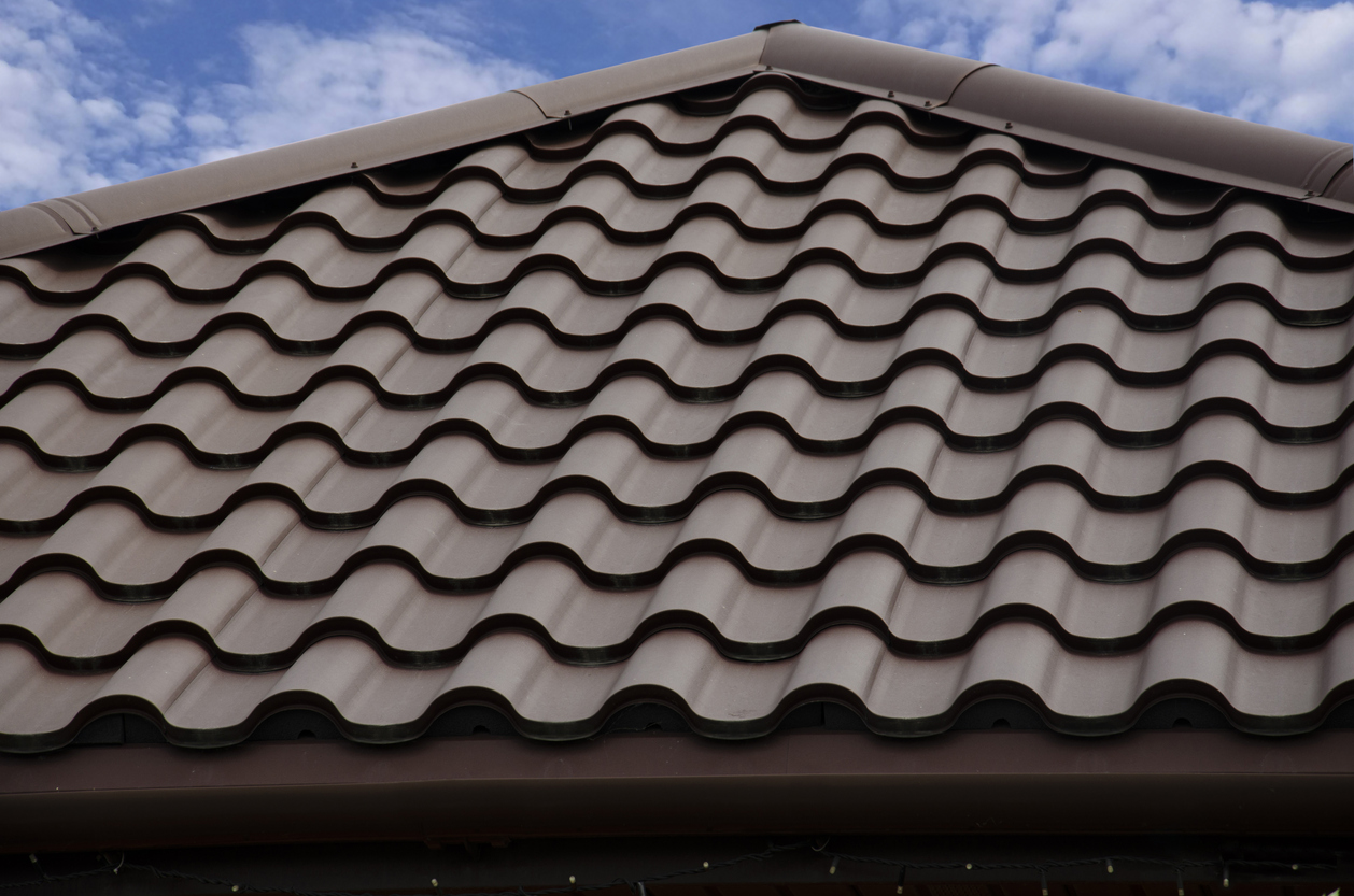 House with a brown Stone-Coated Steel roof