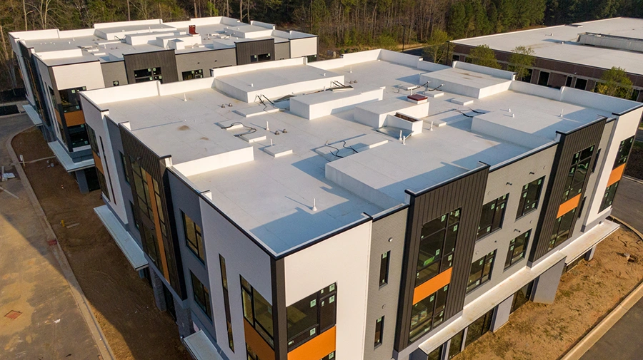 Aerial view of new apartment complex roofing
