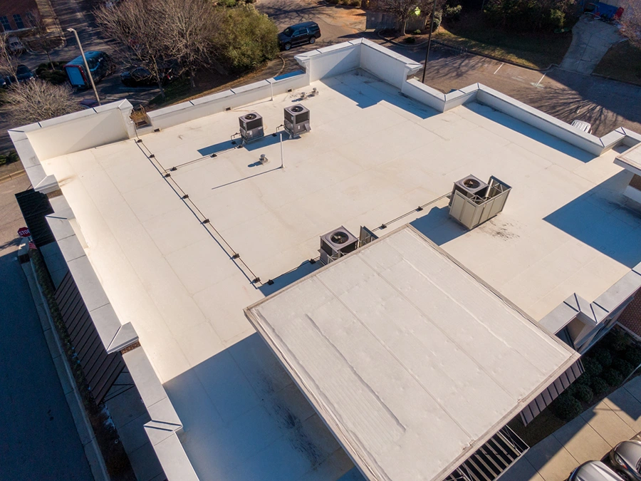 Flat commercial roof replacement services by DryFL