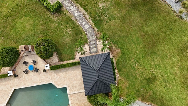 Poolside pavilion with a Worthouse metal roof in Atlantic Grey, Clearwater, FL