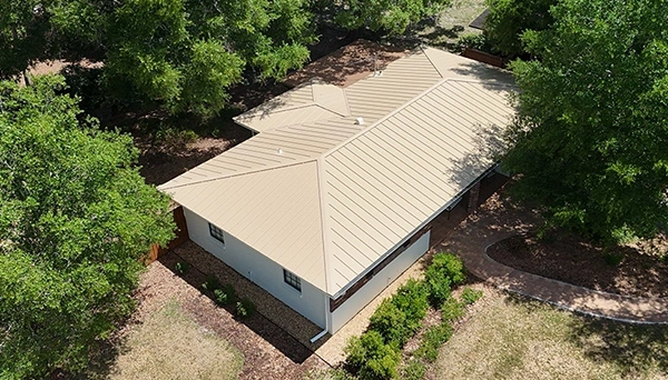 Standing Seam Metal Roofing in Sandstone. Project in Templace Terrace, Florida