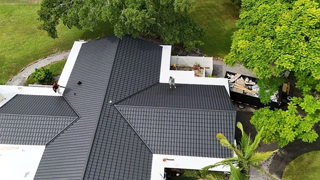Worthouse metal roof in Atlantic Grey with TPO flat roof, Clearwater, FL