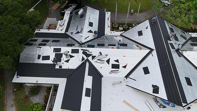 Worthouse metal roof in Atlantic Grey with TPO flat roof, Clearwater, FL