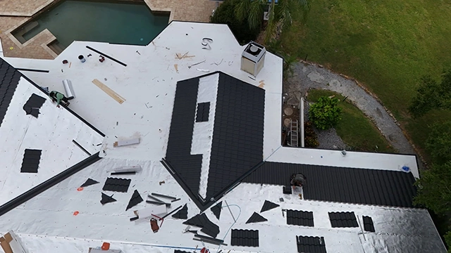 Worthouse metal roof in Atlantic Grey with TPO flat roof, Clearwater, FL