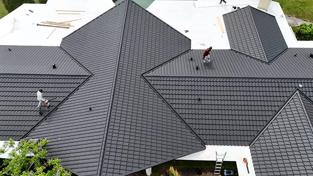 Worthouse metal roof in Atlantic Grey with TPO flat roof, Clearwater, FL