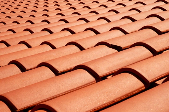 Close-up of terracotta barrel tile roofing on a Florida home